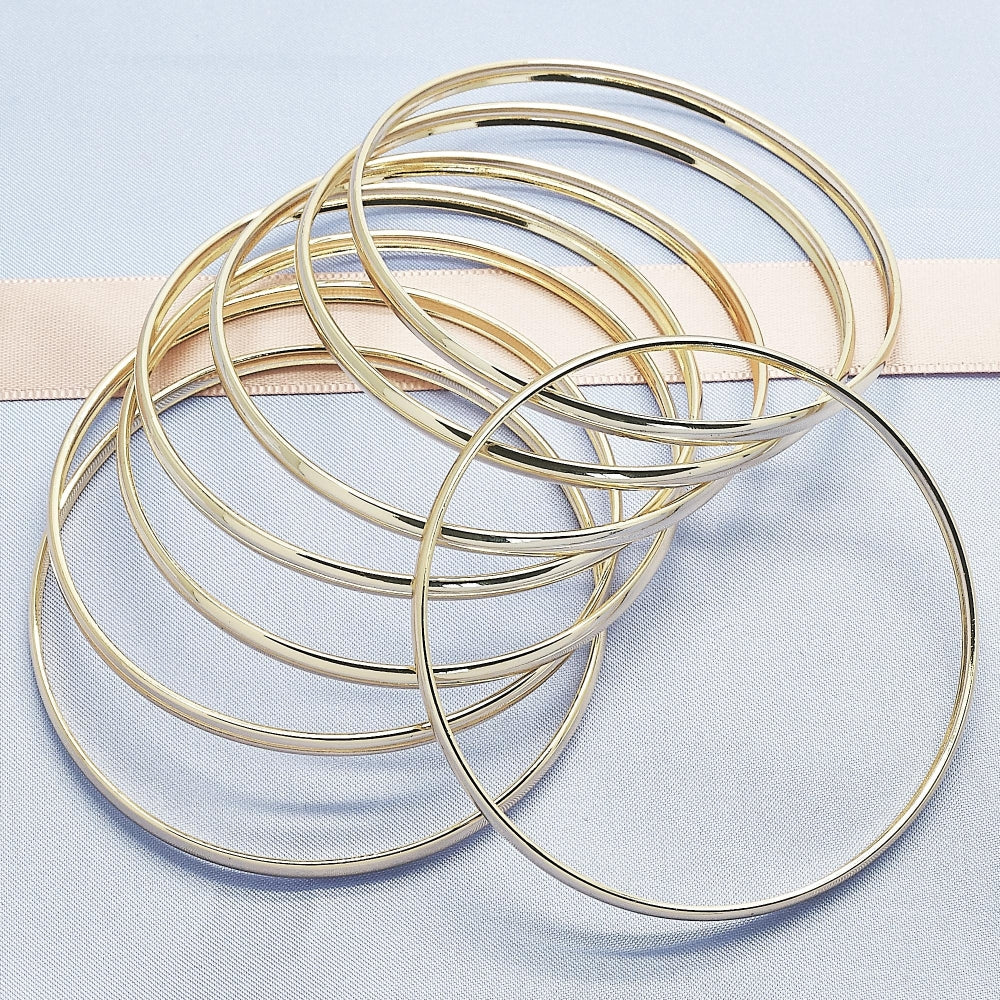Oro Laminado Semanario Bangle, Gold Filled Style Polished, Golden Finish