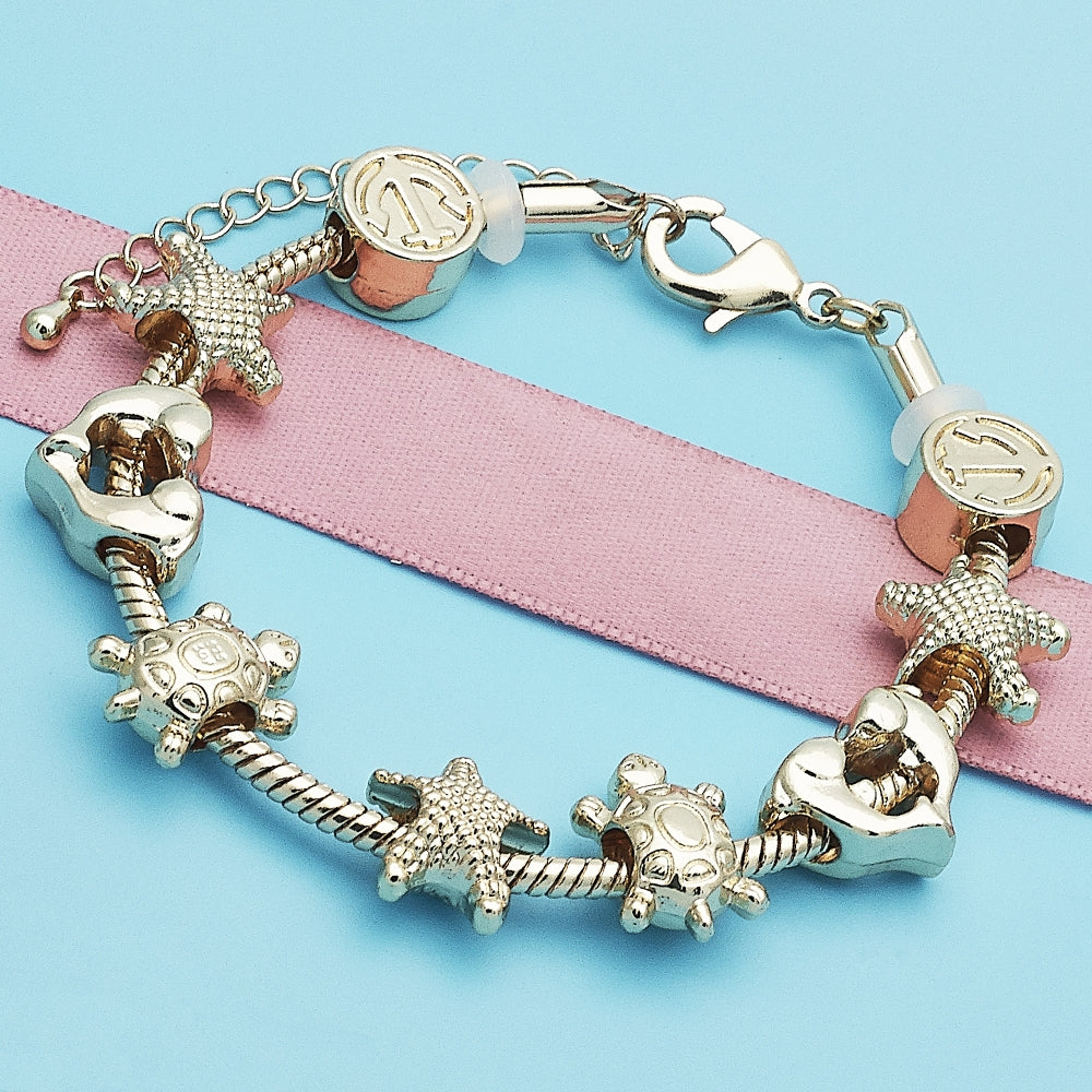 Oro Laminado Fancy Bracelet, Gold Filled Style Star and Turtle Design, Polished, Golden Finish
