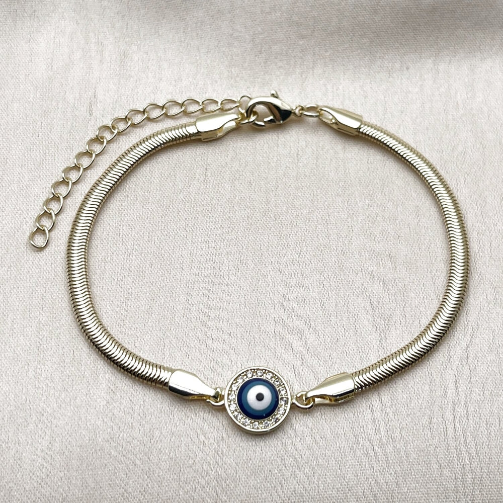 Oro Laminado Fancy Bracelet, Gold Filled Style Evil Eye and Rat Tail Design, with White Micro Pave, Blue Enamel Finish, Golden Finish