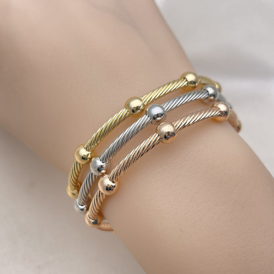 Oro Laminado Trio Bangle, Gold Filled Style and Ball Polished, Tricolor