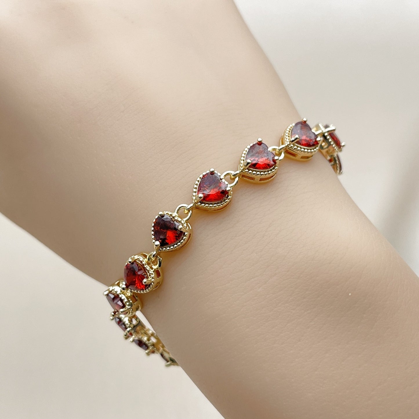 Oro Laminado Tennis Bracelet, Gold Filled Style Heart Design, with Garnet Cubic Zirconia, Polished, Golden
