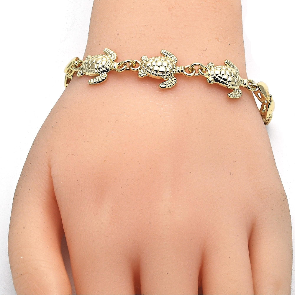 Oro Laminado Fancy Bracelet, Gold Filled Style Turtle and Heart Design, Polished, Golden Finish