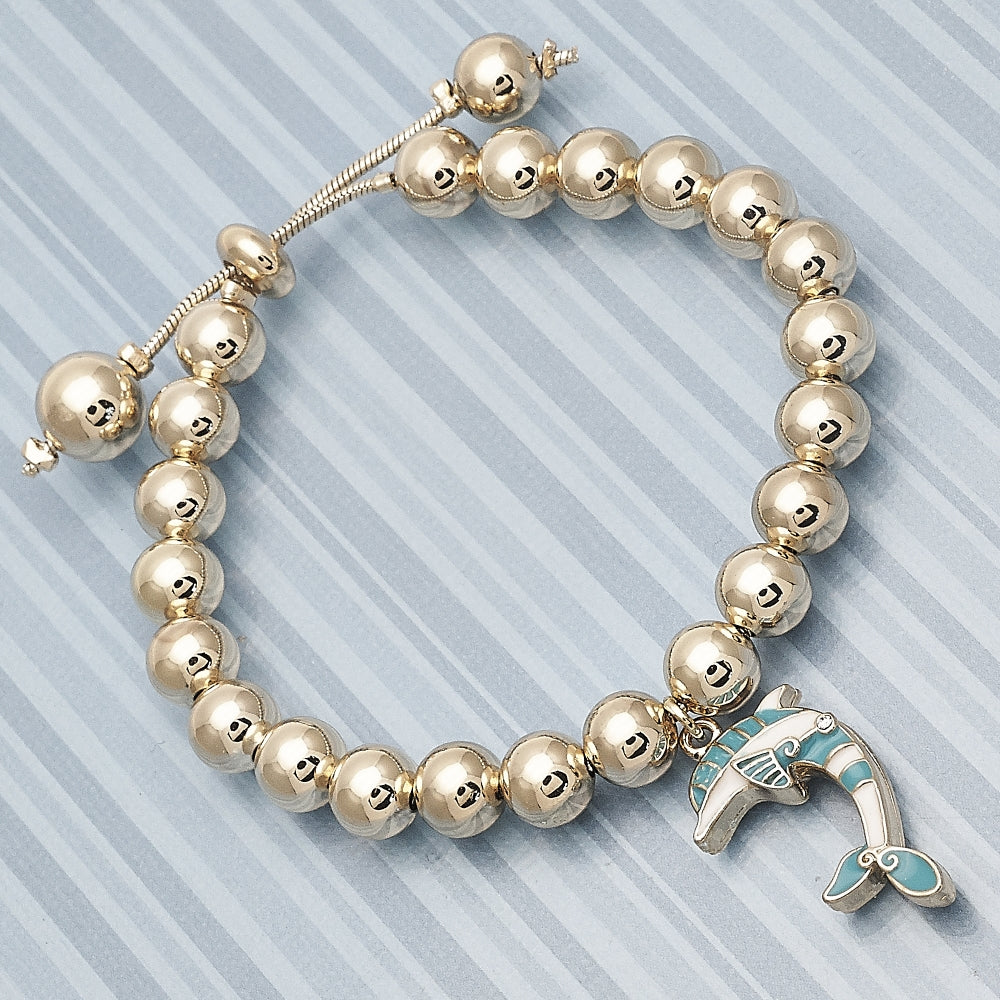 Oro Laminado Adjustable Bolo Bracelet, Gold Filled Style Dolphin and Ball Design, with White Crystal, Turquoise Enamel Finish, Golden Finish