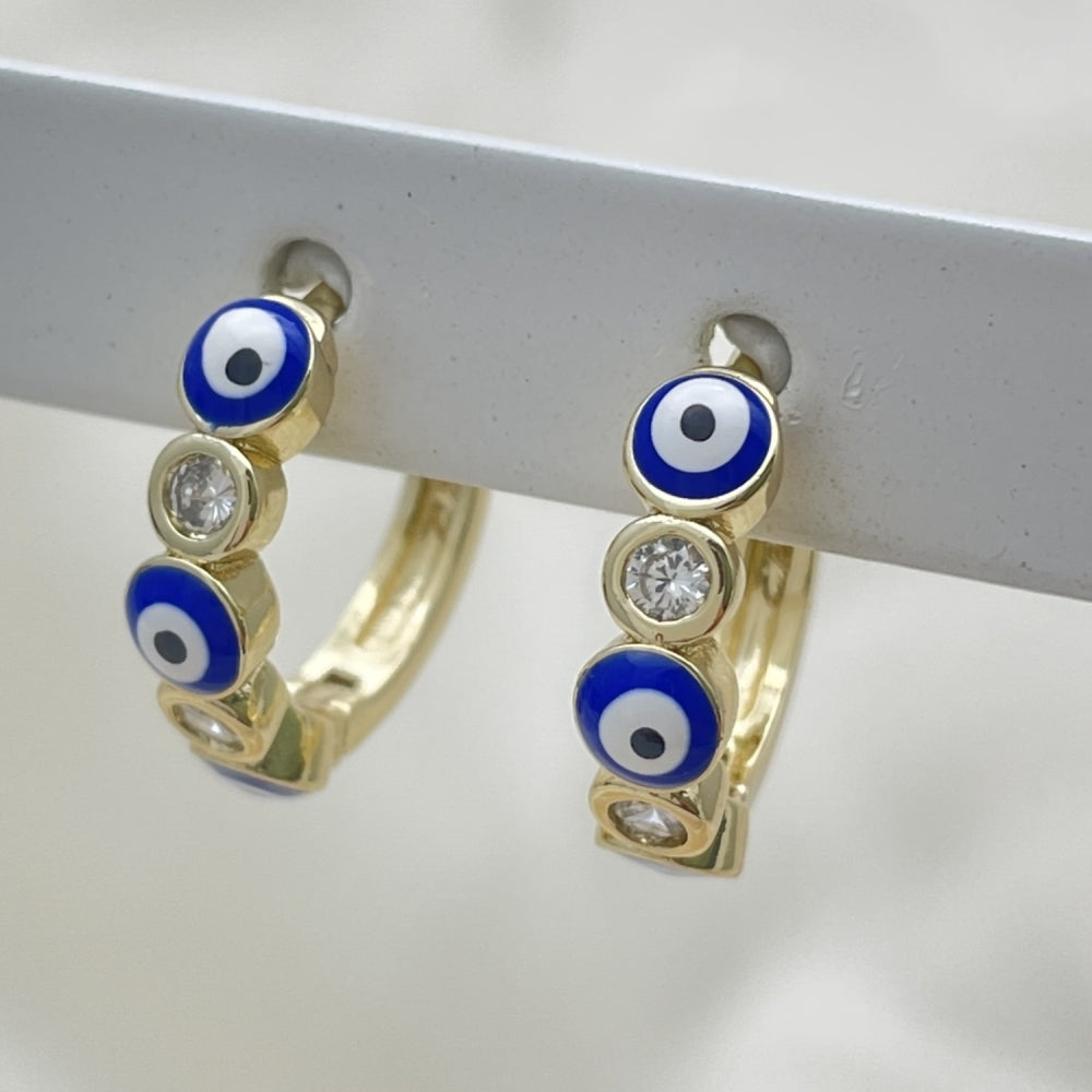 Oro Laminado Huggie Hoop, Gold Filled Style Evil Eye Design, with White Cubic Zirconia, Blue Enamel Finish, Golden Finish