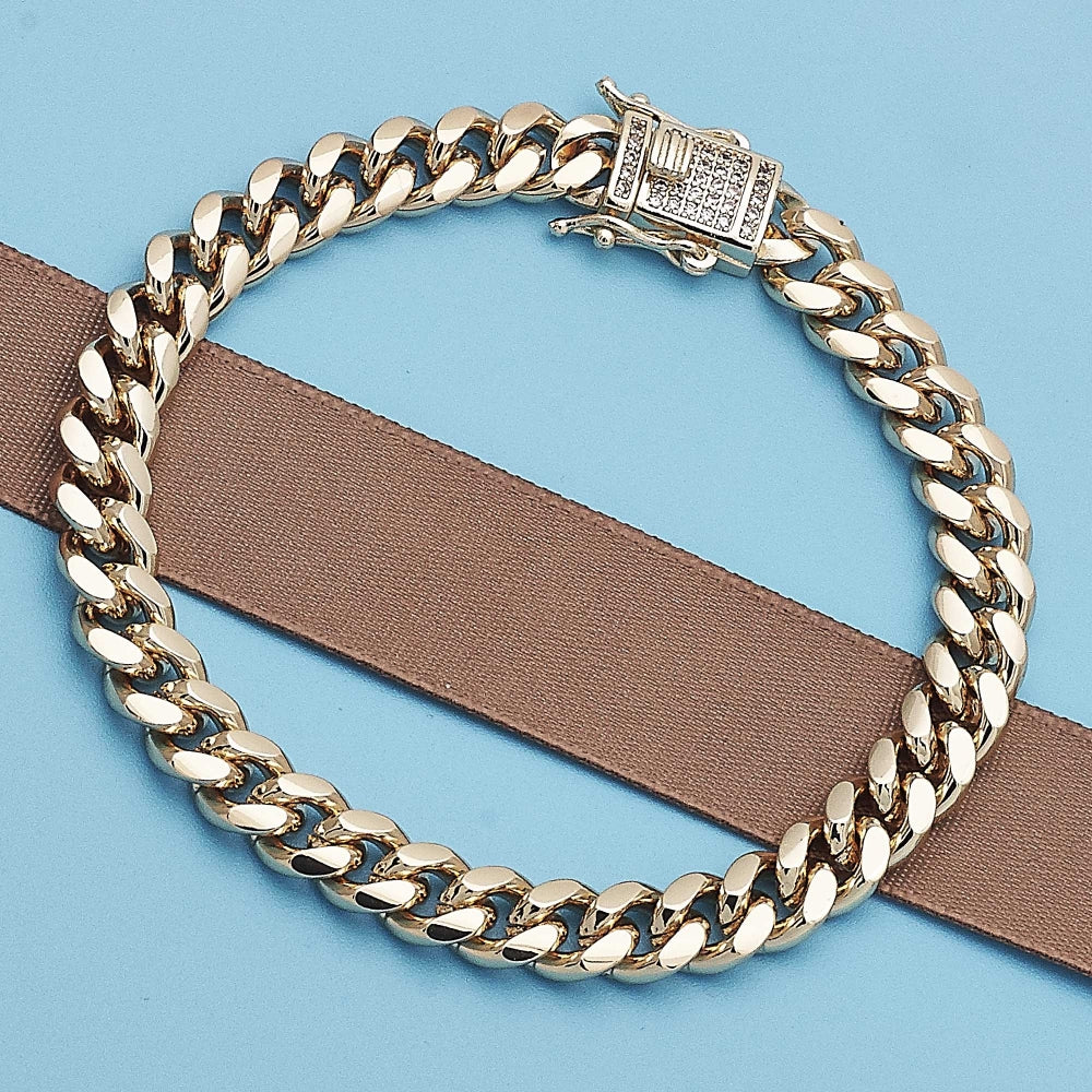 Oro Laminado Basic Bracelet, Gold Filled Style Miami Cuban Design, with White Micro Pave, Polished, Golden Finish