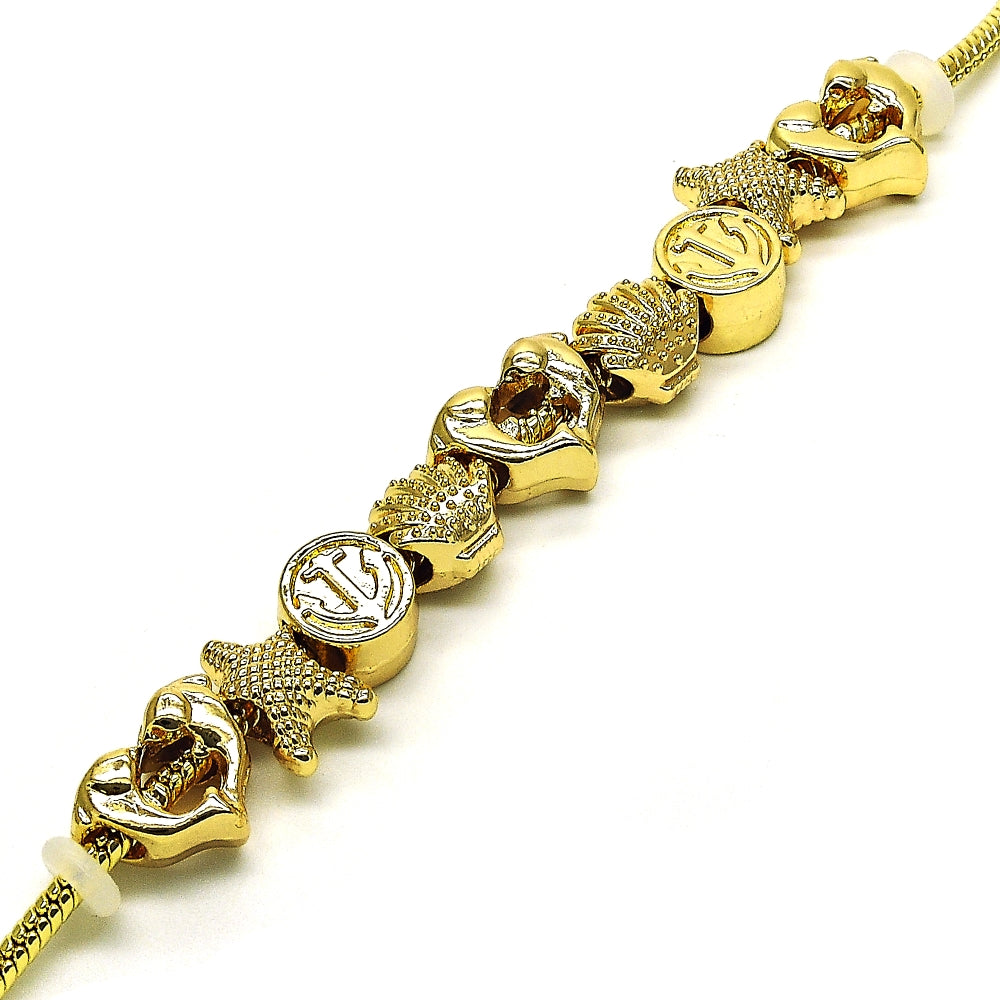 Oro Laminado Fancy Bracelet, Gold Filled Style Dolphin and Shell Design, Polished, Golden Finish