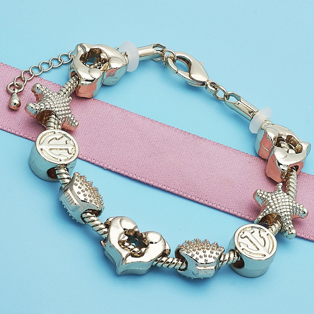 Oro Laminado Fancy Bracelet, Gold Filled Style Dolphin and Shell Design, Polished, Golden Finish