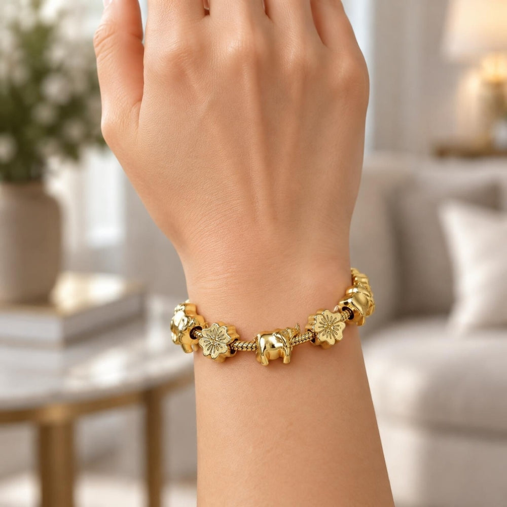 Oro Laminado Fancy Bracelet, Gold Filled Style Elephant and Four-leaf Clover Design, Polished, Golden Finish