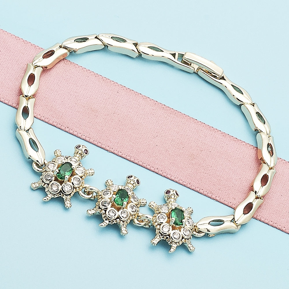Oro Laminado Fancy Bracelet, Gold Filled Style Turtle and Fish Design, with Green and White Cubic Zirconia, Polished, Golden Finish