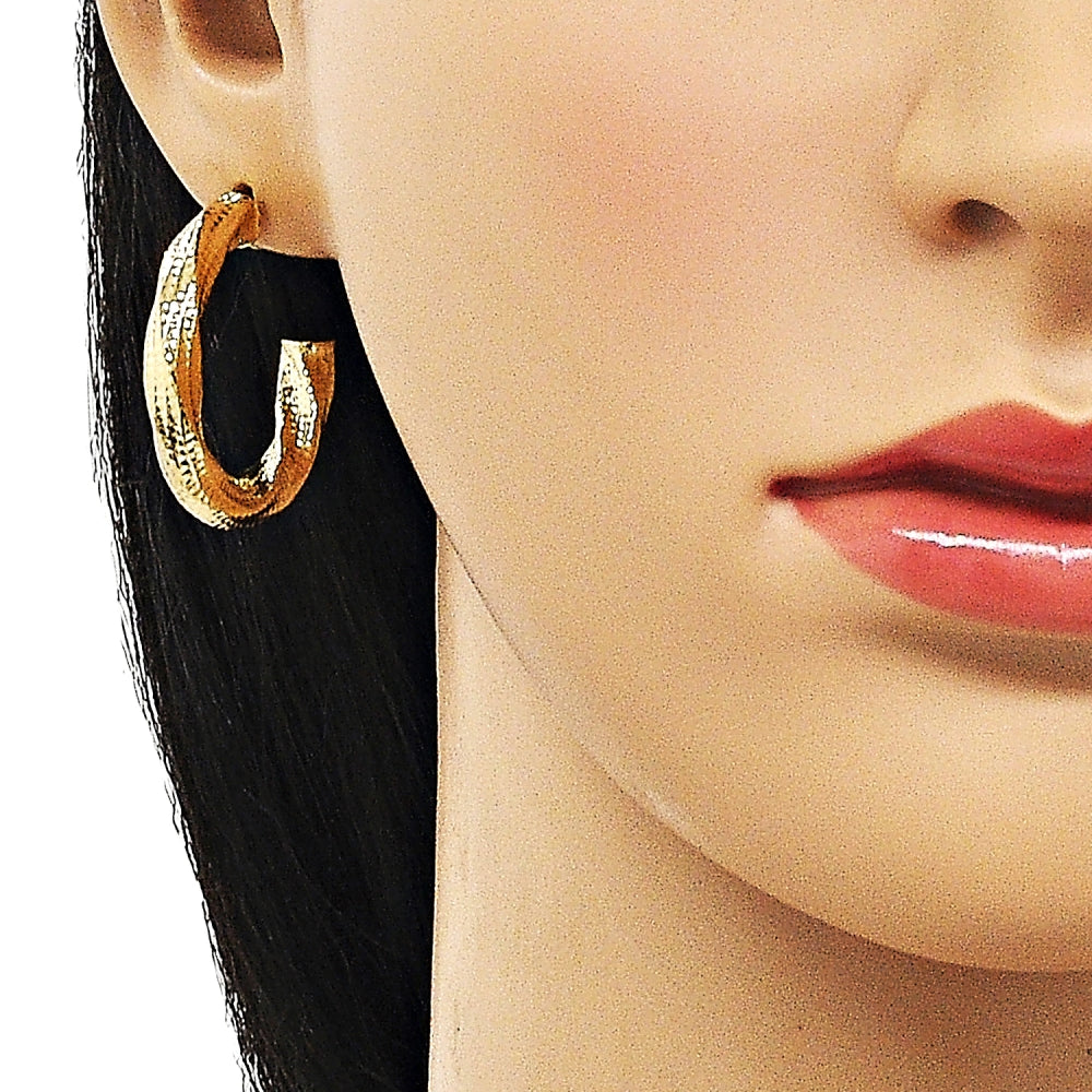 Oro Laminado Medium Hoop, Gold Filled Style Twist and Hollow Design, Diamond Cutting Finish, Golden Finish