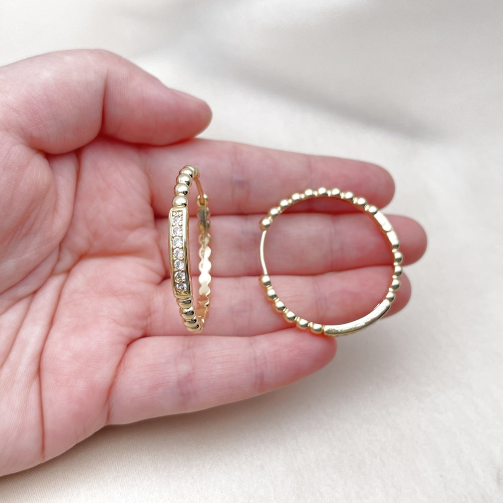 Oro Laminado Huggie Hoop, Gold Filled Style Ball Design, with White Cubic Zirconia, Polished, Golden Finish