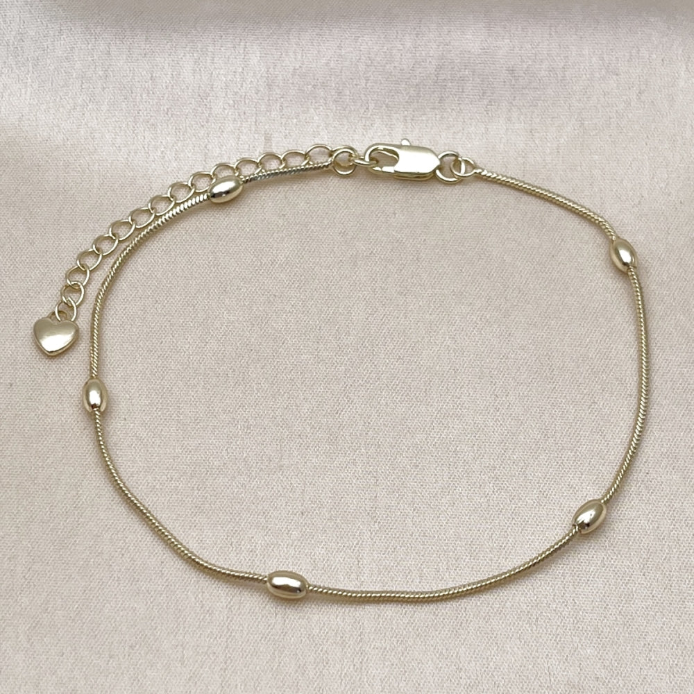 Oro Laminado Basic Anklet, Gold Filled Style Rat Tail and Ball Design, Polished, Golden Finish