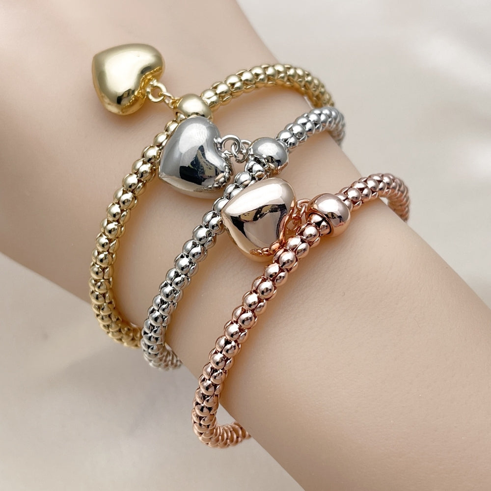 Oro Laminado Trio Bangle, Gold Filled Style Heart Design, Polished, Tricolor