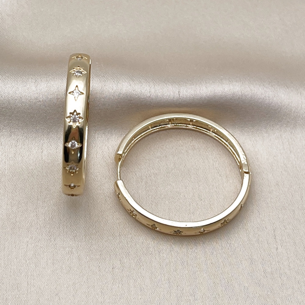 Oro Laminado Huggie Hoop, Gold Filled Style Star Design, with White Cubic Zirconia, Polished, Golden Finish