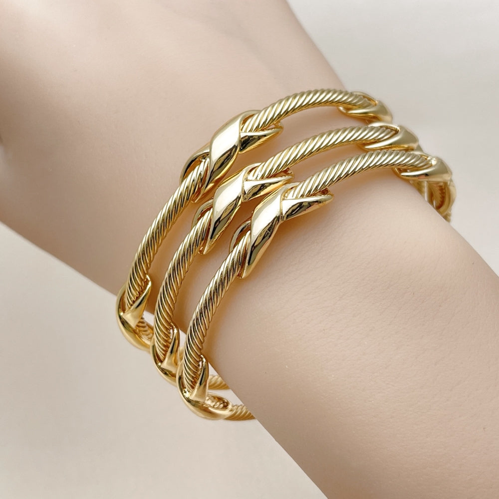 Oro Laminado Trio Bangle, Gold Filled Style Twist and Infinite Design, Polished, Golden Finish