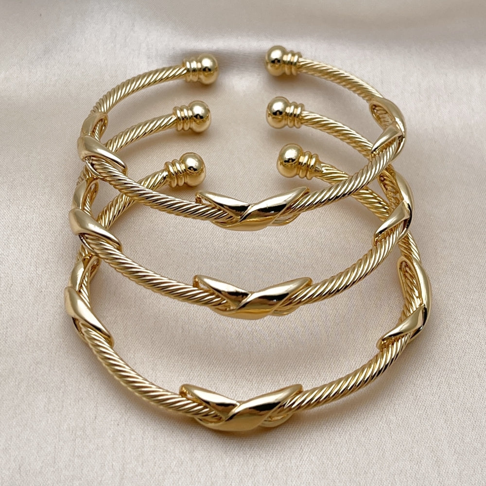 Oro Laminado Trio Bangle, Gold Filled Style Twist and Infinite Design, Polished, Golden Finish