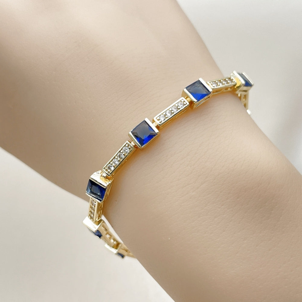 Oro Laminado Tennis Bracelet, Gold Filled Style with Sapphire Blue and White Cubic Zirconia, Polished, Golden Finish