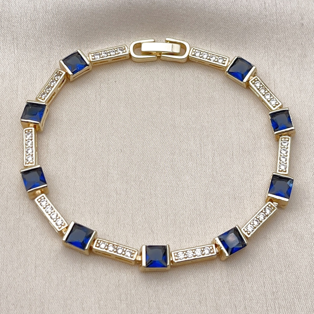 Oro Laminado Tennis Bracelet, Gold Filled Style with Sapphire Blue and White Cubic Zirconia, Polished, Golden Finish