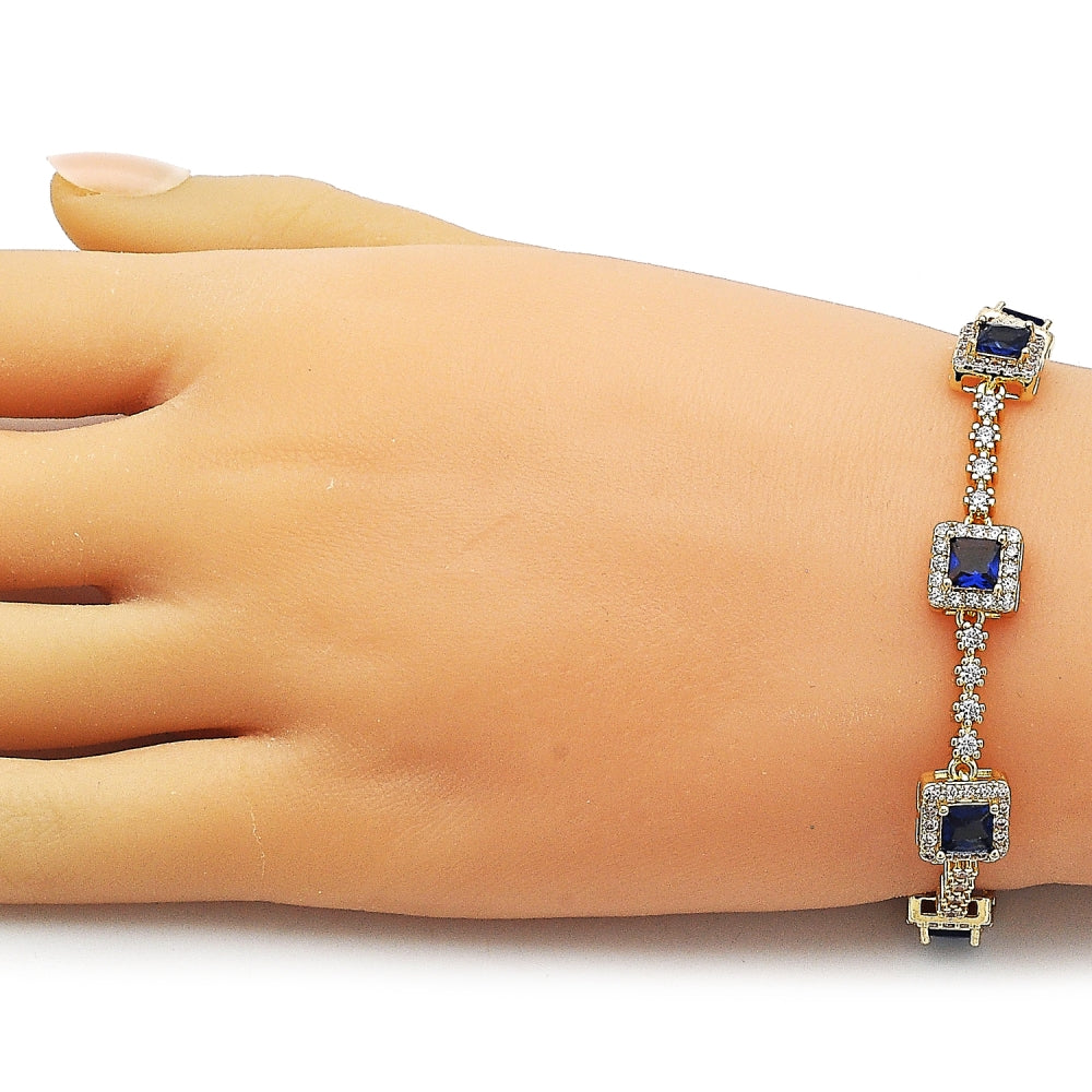 Oro Laminado Tennis Bracelet, Gold Filled Style Cluster Design, with White and Sapphire Blue Cubic Zirconia, Polished, Golden Finish