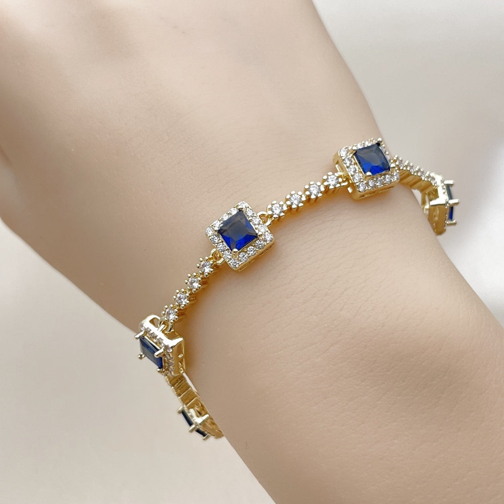 Oro Laminado Tennis Bracelet, Gold Filled Style Cluster Design, with White and Sapphire Blue Cubic Zirconia, Polished, Golden Finish