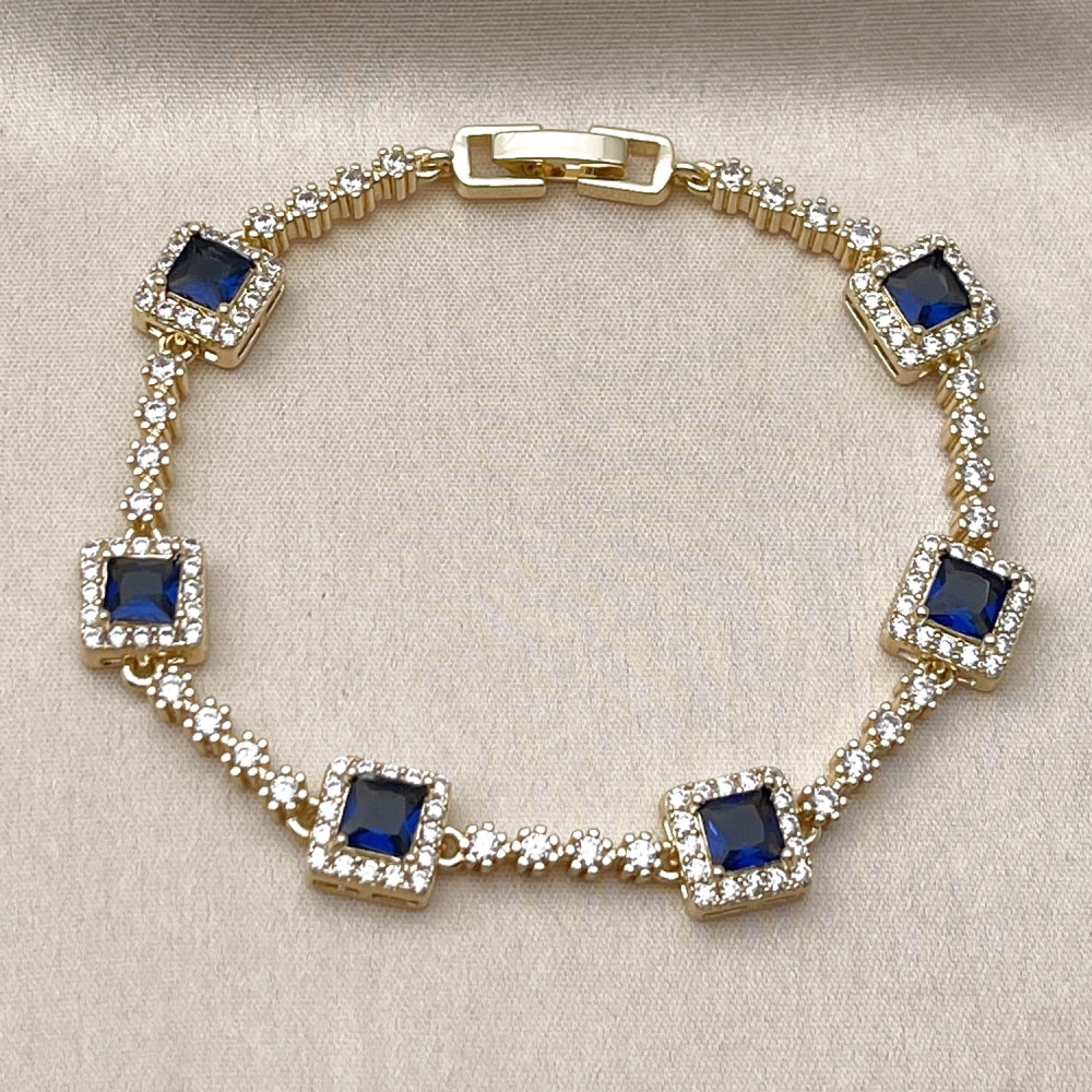 Oro Laminado Tennis Bracelet, Gold Filled Style Cluster Design, with White and Sapphire Blue Cubic Zirconia, Polished, Golden Finish