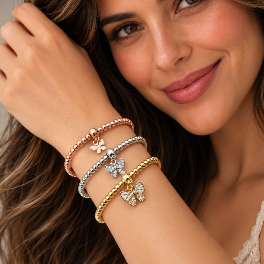 Oro Laminado Trio Bangle, Gold Filled Style Butterfly and Ball Design, with White Cubic Zirconia, Polished, Tricolor