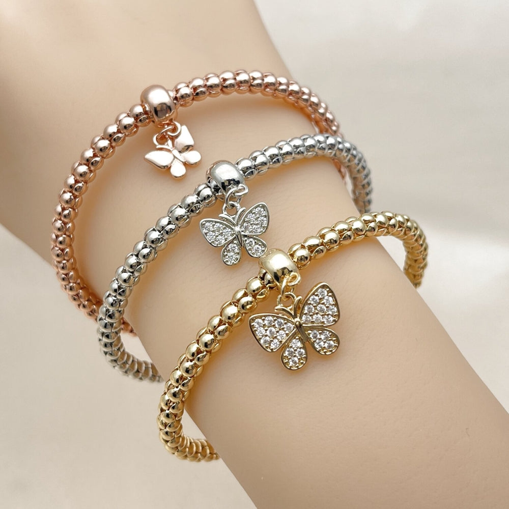 Oro Laminado Trio Bangle, Gold Filled Style Butterfly and Ball Design, with White Cubic Zirconia, Polished, Tricolor