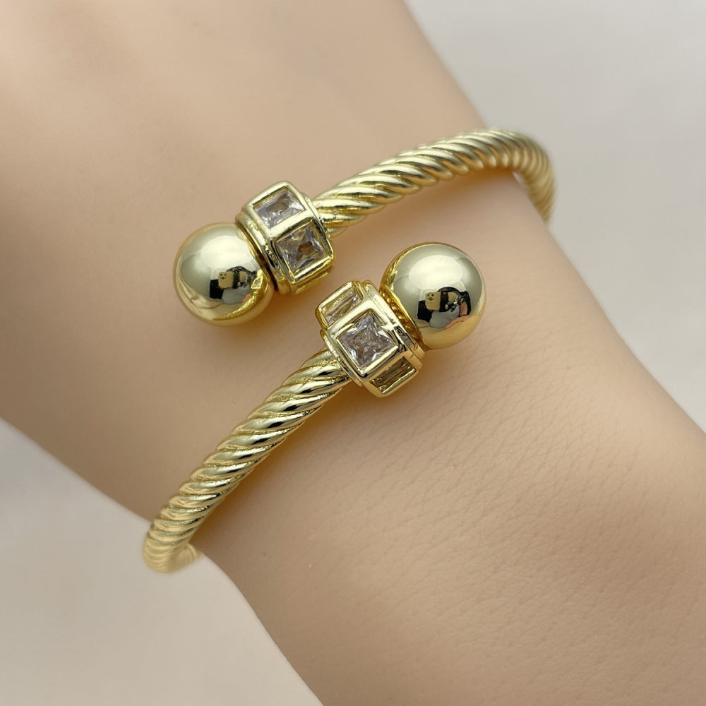 Oro Laminado Individual Bangle, Gold Filled Style Twist and Ball Design, with White Cubic Zirconia, Polished, Golden Finish
