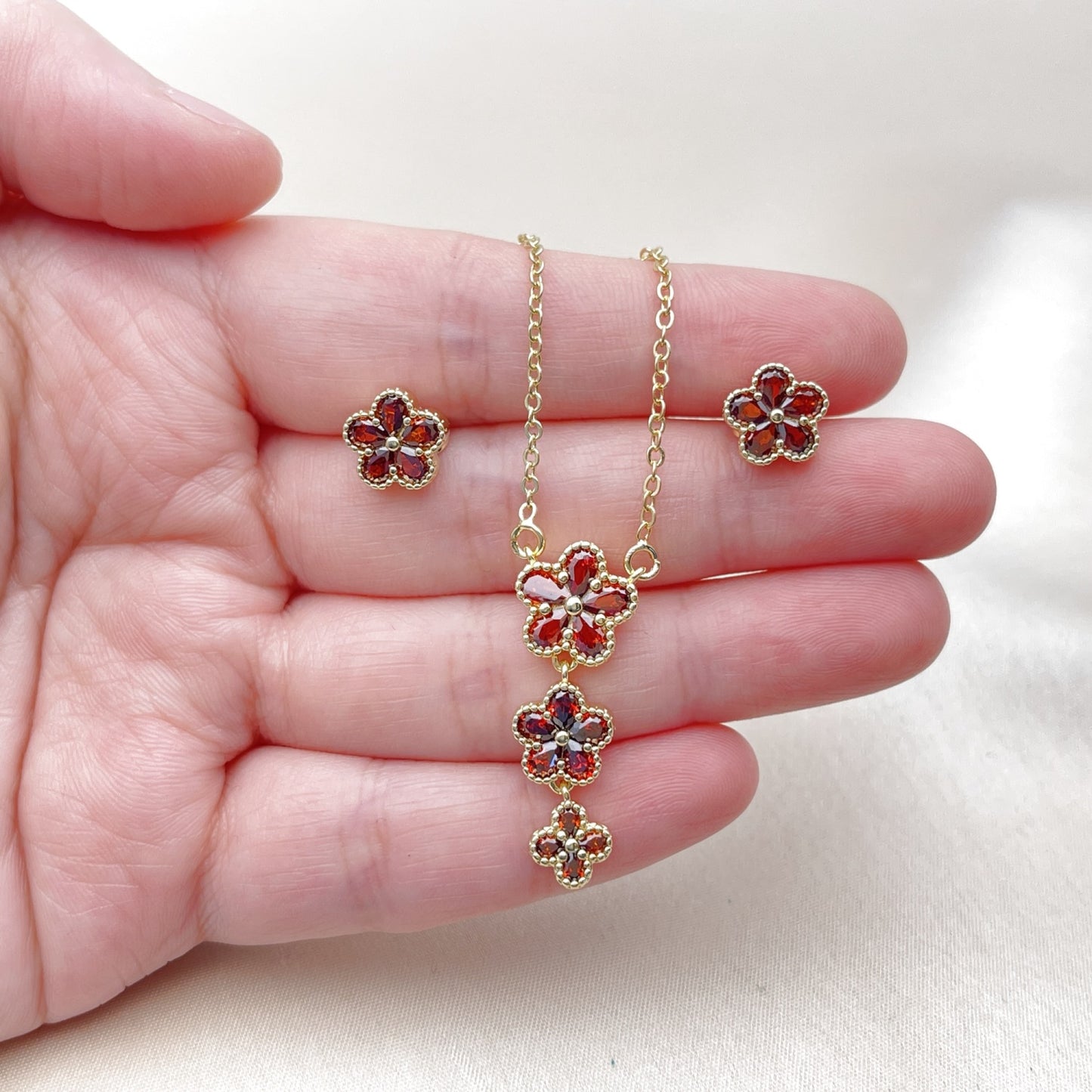 Oro Laminado Earring and Pendant Adult Set, Gold Filled Style Flower Design, with Garnet Cubic Zirconia, Polished, Golden Finish